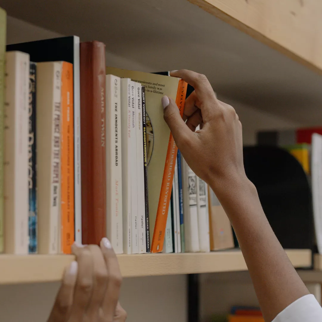 person checking out book